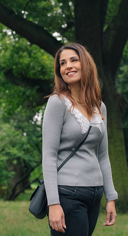 Photo of Woman Wearing Grey Top