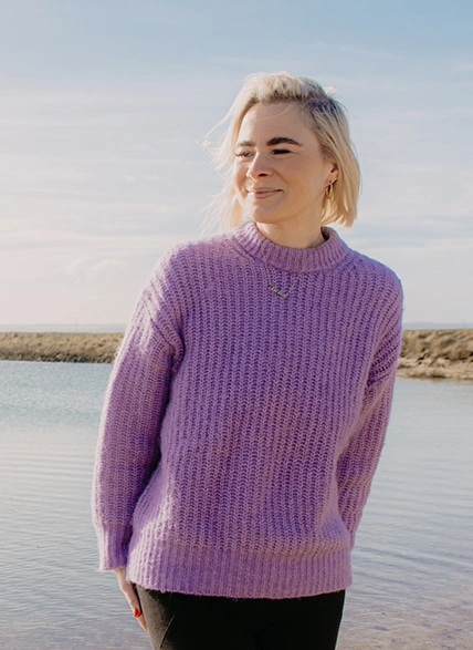 BMI Calculator Title Bar Image of Woman in Purple Jumper