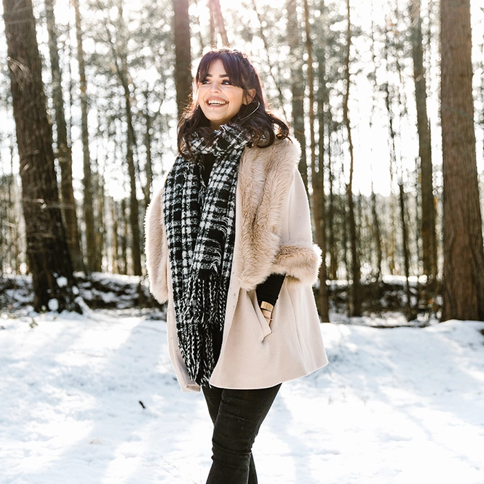 Photo of Lady in Snowy Forest